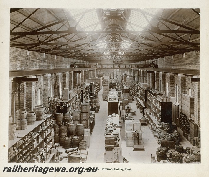 P13410
54 of 67 views taken from an album of photos of the Midland Workshops c1905. Main Store, - Interior, Looking East.

