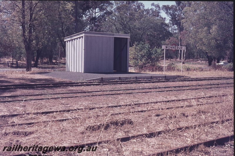 P13441
Station shed on low level platform, nameboard, Wonnerup, BB line, view across the tracks.
