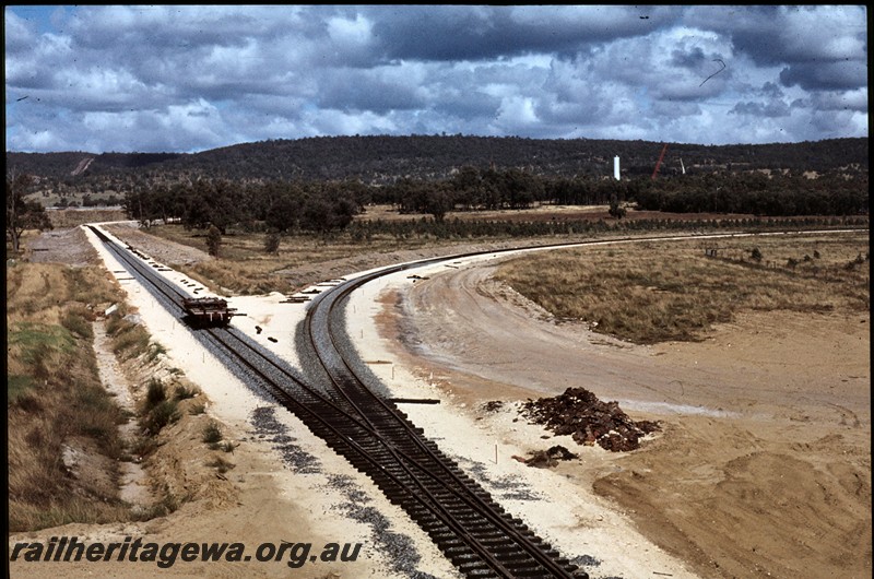 P13446
Trackwork, newly laid line to the Alcoa refinery, Wagerup, SWR line, elevated view along the line showing the diverging lines.
