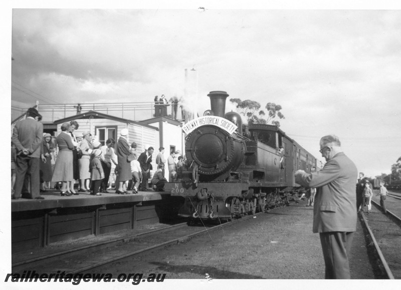 P13476
N class 200, 4-4-4T steam locomotive, station buildings, crowd on the platform, Armadale, SWR line, ARHS tour train ready to depart for Jandakot - Fremantle - Perth.
