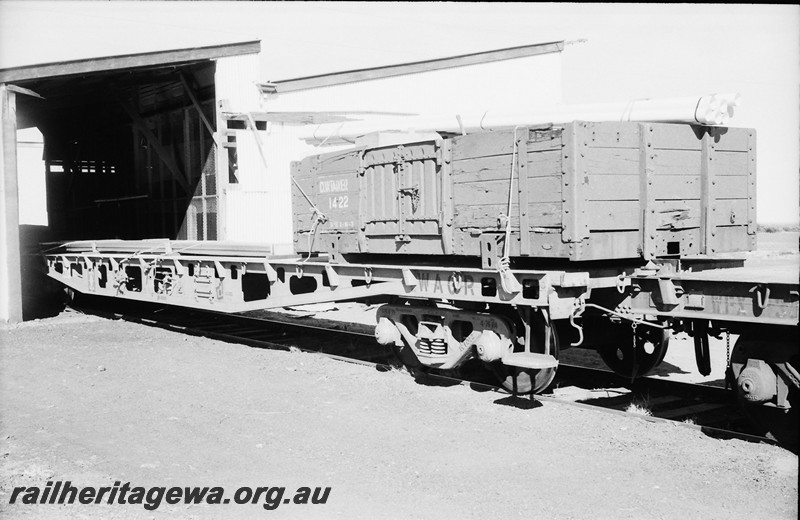 P13867
WFX class standard gauge flat wagon (later reclassified to WQCX),with container No.1422 tied on with ropes on board, container is an ex GST class wagon, side and end view.
