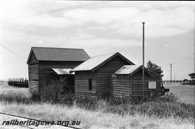 P13925
2 of 32 images of the railway and jetty precincts of Busselton, BB line, group of small weatherboard buildings with sign 