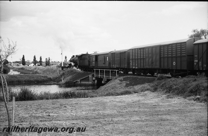 P13953
30 of 32 images of the railway and jetty precincts of Busselton, BB line, W class, crossing the bridge over the Vasse River, goods train
