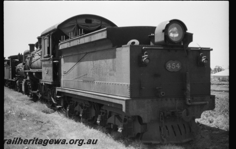 P13987
FS class 454, East Perth Loco Depot, side and end view of the tender showing a headlight and cow catcher on the tender.
