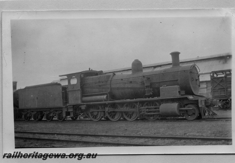 P14187
Commonwealth Railways (CR) K class 2-8-0 freight loco, side view.
