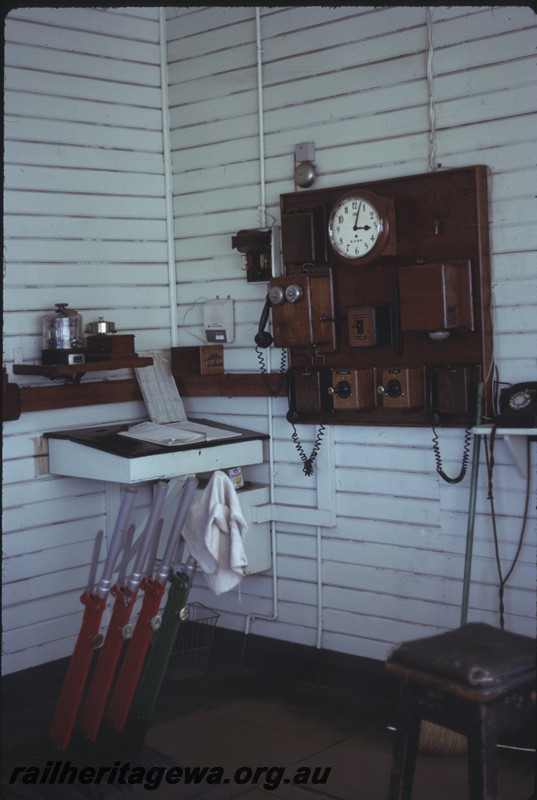 P14257
Lever frame, clock, telephones, internal view of signal box, Maylands, ER line. 
