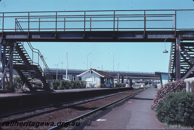 P14376
Footbridge, station buildings, West Perth, view looking east along the track
