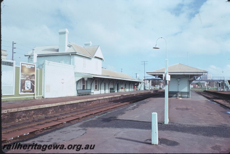 P14394
Station buildings, island platform, platform lamp, Claremont, view along the platform looking west
