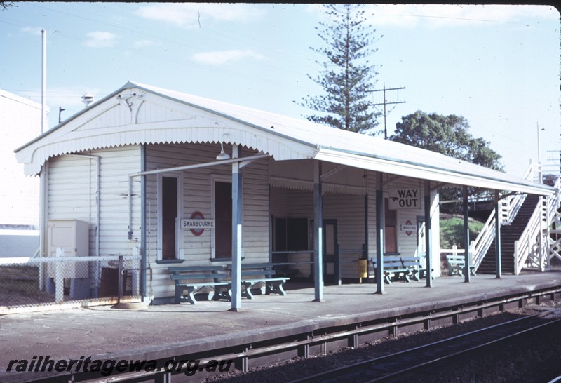 P14398
Station building, relay box, station seats, Swanbourne, east end and trackside view of the main building
