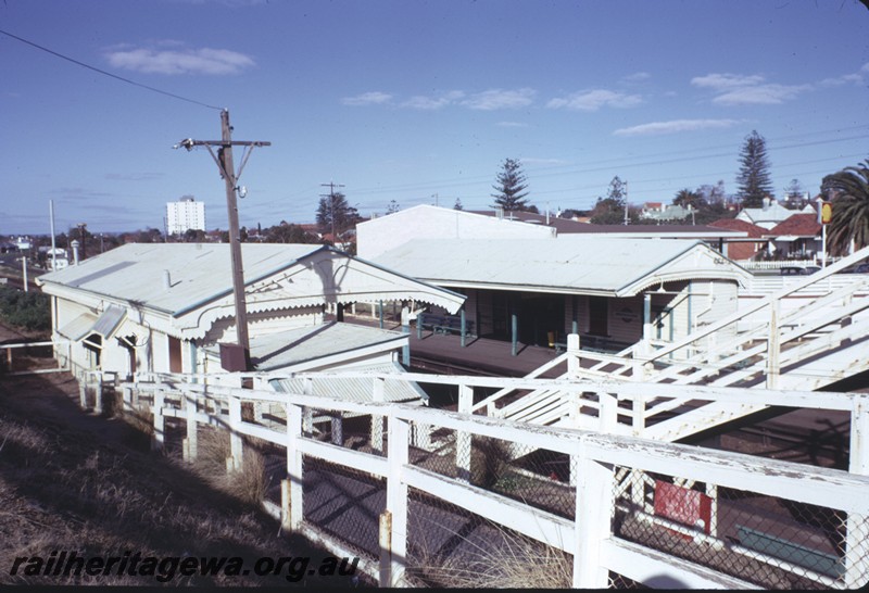 P14400
Station buildings, footbridge, Swanbourne, elevated view of both buildings looking east.
