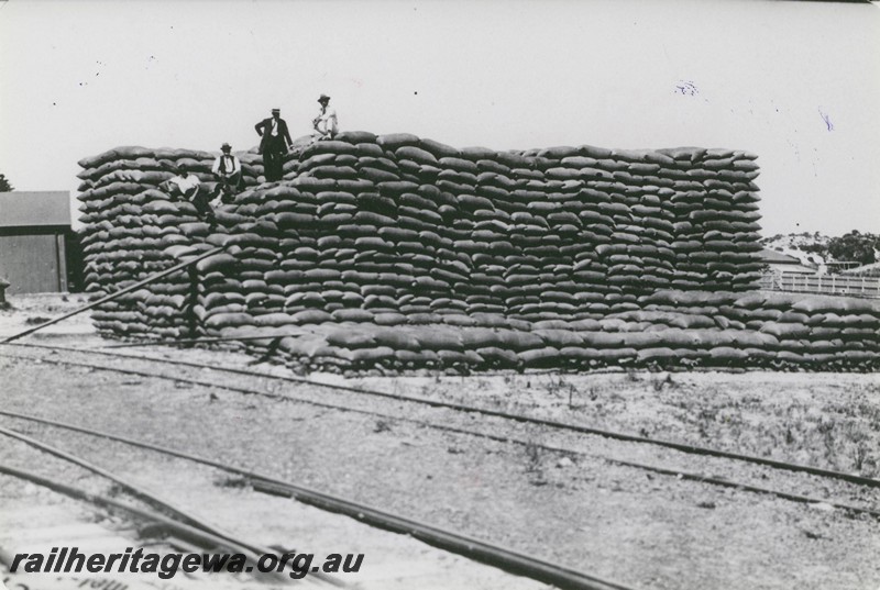 P14495
Stack of bagged wheat, Esperance Yard, CE line, view across the tracks, c1925
