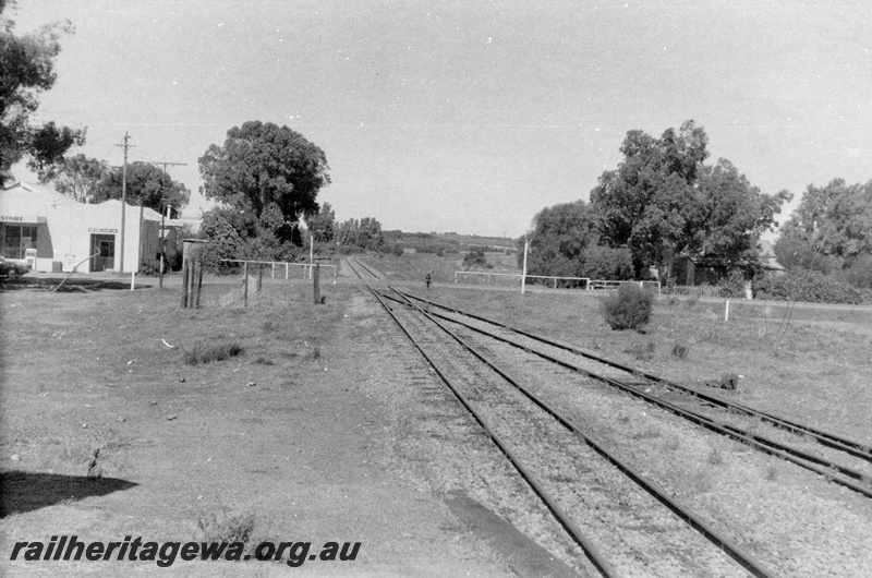 P15180
4 of 8 images of the railway precinct at Walkaway, W line, view looking southwards along the track from the station towards the level crossing 
