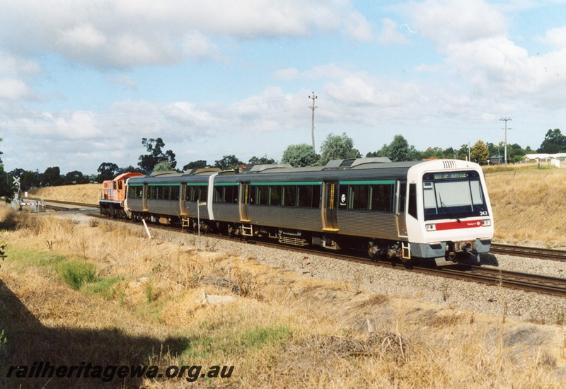 P15527
 AEB class 343 and AEA class 243 electric multiple units being hauled by PTA loco, MA class 1862 long hood leading heading southwards through Hazelmere to Forrestfield yard
