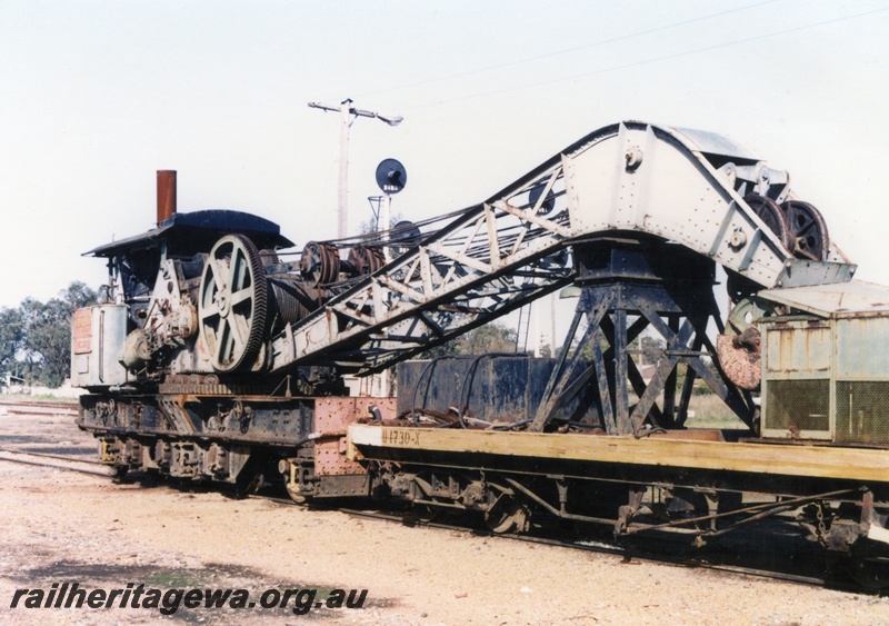 P15533
Cravens 25 ton breakdown crane No. 23 coupled to its match wagon, U class 1730-X in yellow livery, Pinjarra, SWR line, side and front view
