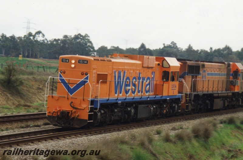 P15545
Dynamic braked A class 1514 double heads a freight train southwards through Hazelmere towards Forrestfield

