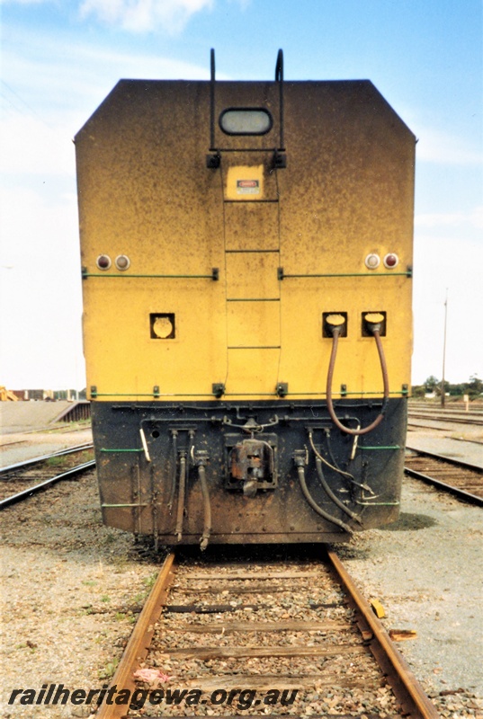 P15575
Australian National EL class 56X, end view of loco painted yellow with accumulated grime. Forrestfield Yard.

