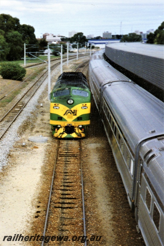 P15620
Australian National CLP class 16 in the green and yellow livery, East Perth terminal, running around its train, s
