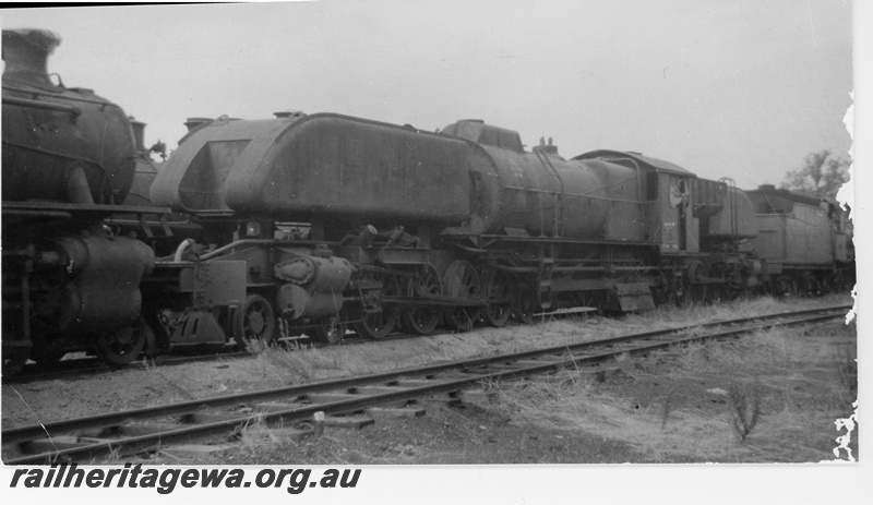 P16395
ASG class loco, awaiting scrapping, front and side view
