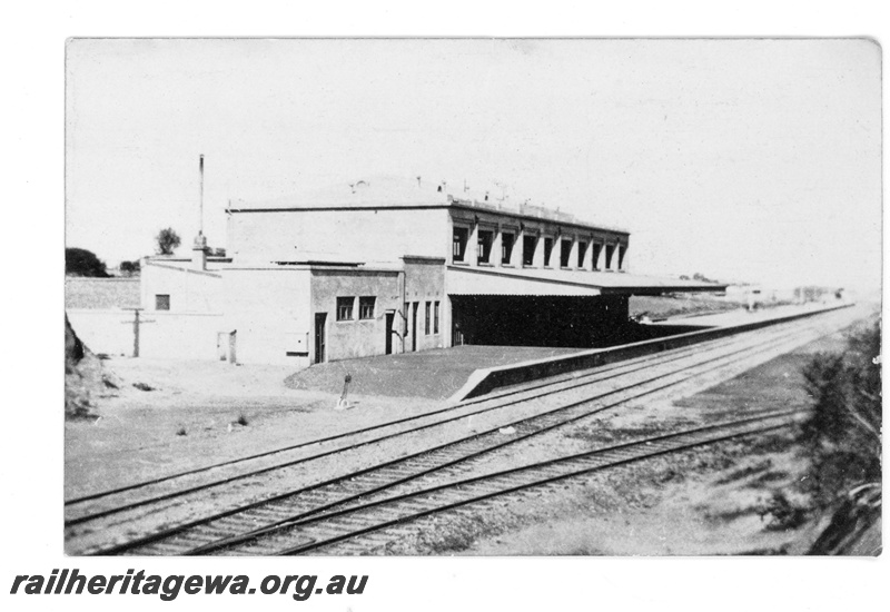 P16848
Commonwealth Railways (CR) - TAR line Port Augusta Station view from north end of station. Narrow gauge dock platform in background. C1930
