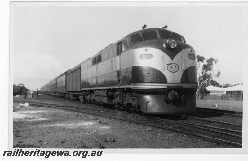 P16883
Commonwealth Railways (CR) - TAR line GM class 8 hauling Trans Australian express at Cook.
