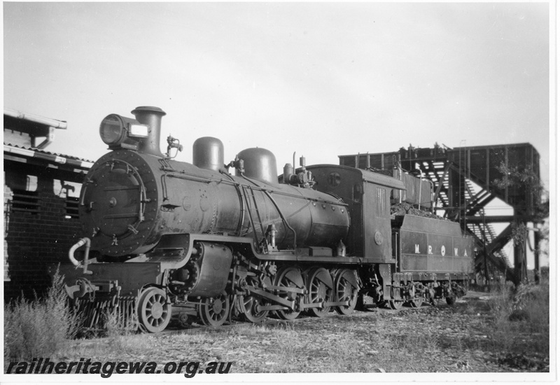P16898
MRWA D class 20 steam locomotive, coaling tower at the Watheroo loco depot, MR line, front and side view, c1960s.
