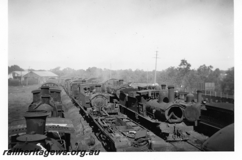 P16983
Derelict steam locos awaiting scrapping, Midland Workshops, ER line, c1950s
