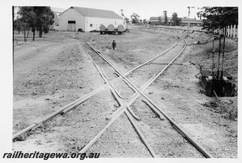 P17115
Crossover of narrow and two foot gauge, warehouse, signal, trackside signal levers, Kamballie, B line
