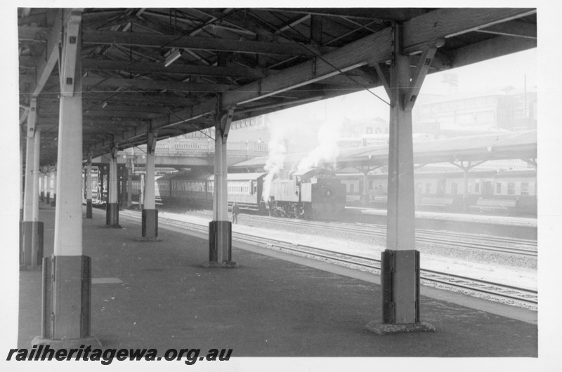 P17160
Passenger platform, steam locomotive on passenger train and diesel railcars in the background, Perth, ER line.

