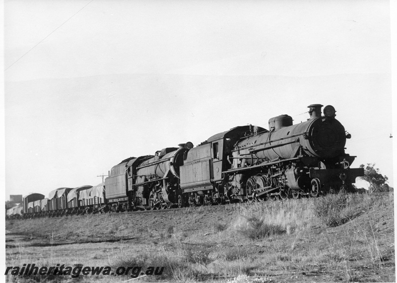 P17229
W class 959 and V class loco, double heading goods train, water tower, side and front view, c1969
