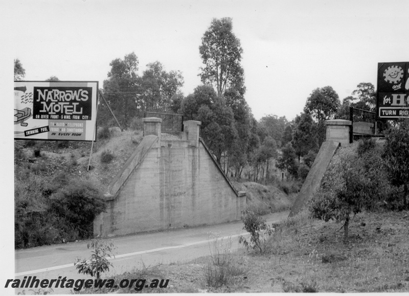 P17572
1 of 2, Flyover abutments at Great Eastern Highway between Mundaring and Sawyers Valley, bridge span removed, advertising hoardings, M line.
