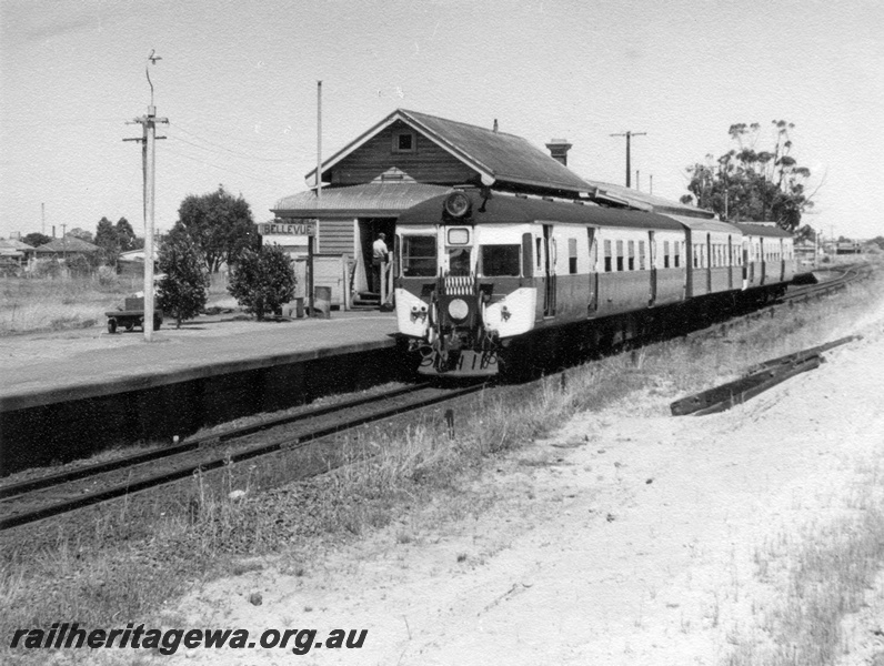 P17806
A 3 car unidentified ADG/AYE/ADG suburban rail car set at Bellevue enroute to Koongamia. M line. Note portion of station building and platform.
