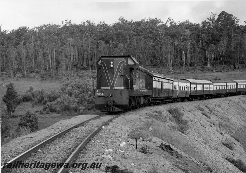 P17825
3 of 3 of A class 1504 diesel locomotive on the Jarrahdale branch line with a ARHS Tour train.
