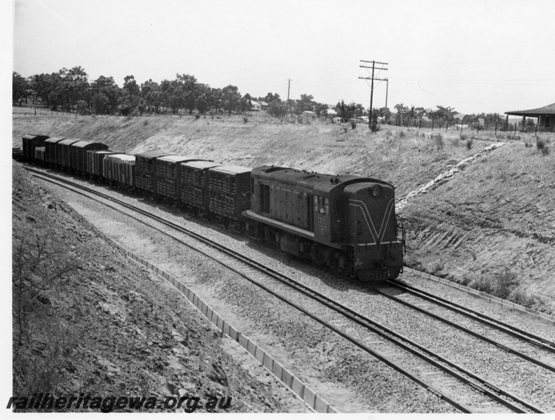P17934
C class 1701, on up goods train No 122, passing through cutting, side and front view
