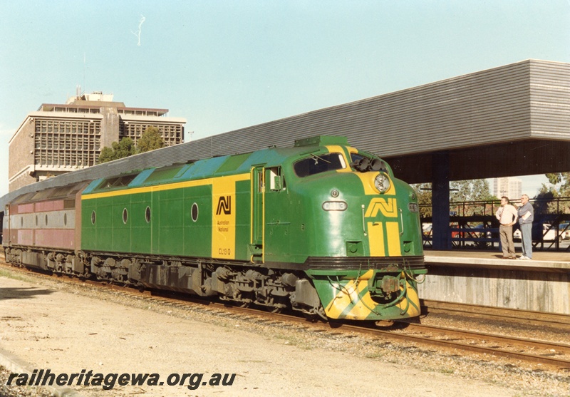 P18026
CL class 17 in Commonwealth Railways (CR) colour scheme, coupled with CL class 17 in AN livery, Westrail Centre building, East Perth Terminal, side and end view
