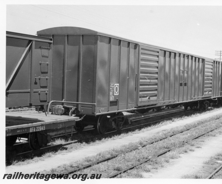 P18363
3 of 4 images of Commonwealth Railways (CR) wagons at Bassendean, including VE class 1871, NFA class 22845 flat bed wagon, end and side view
