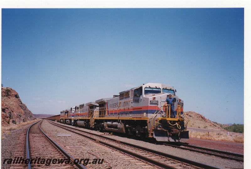 P18999
Hamersley Iron (HI) C44-9W class 7080 and 7082 lead an iron ore train of 4 locomotives between Tom Price and Dampier. 
