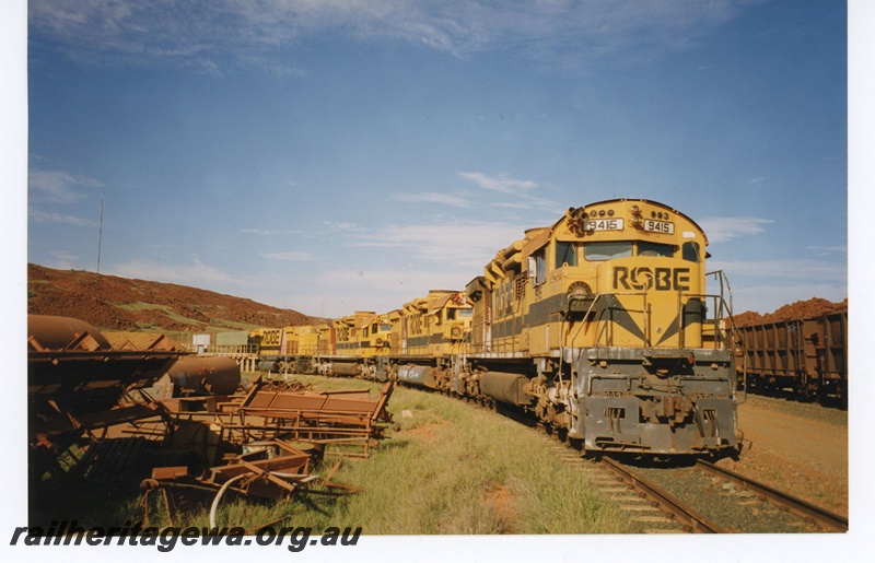 P19061
Robe River iron Associates (RRIA) M636 class 9415, 9413, 9416, 9412stored at Cape Lambert.
