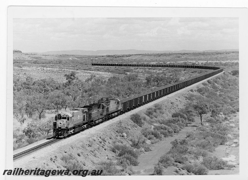 P19232
Mount Newman Mining (MNM) M 636 class 5491 hauling a 150 car loaded iron ore train towards Port Hedland. 
