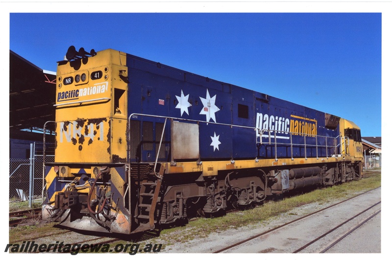 P19341
Pacific National NR class 41, yellow and blue livery, parked on the loop, Rail Transport Museum, Bassendean, end and side .
