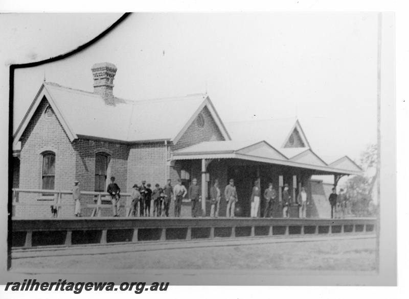 P19350
Station building, Guildford, original structure, passengers waiting on the platform, trackside view looking west
