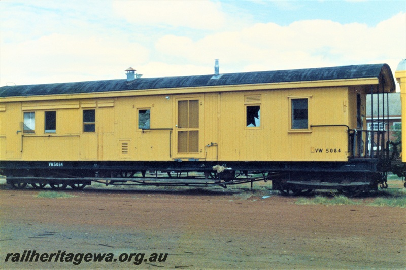 P19375
VW class 5084, ex ZA class 168 with end platform, yellow livery, old Northam Yard, mainly a side view.
