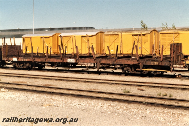 P19452
QS class 16100 Sleeper Wagon, stanchions and end bulkheads, brown livery, Forrestfield Yard, side and end view
