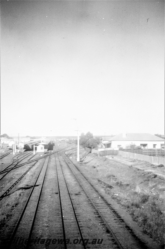 P19525
Platforms, canopies, sidings, signals, Kalgoorlie station, EGR line, view looking west from Maritana Street bridge

