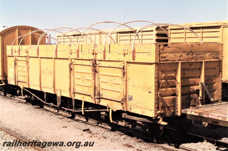 P19566
RBW class 11226 bogie open wagon, with cane hoops, yellow livery, Forrestfield, side and end view

