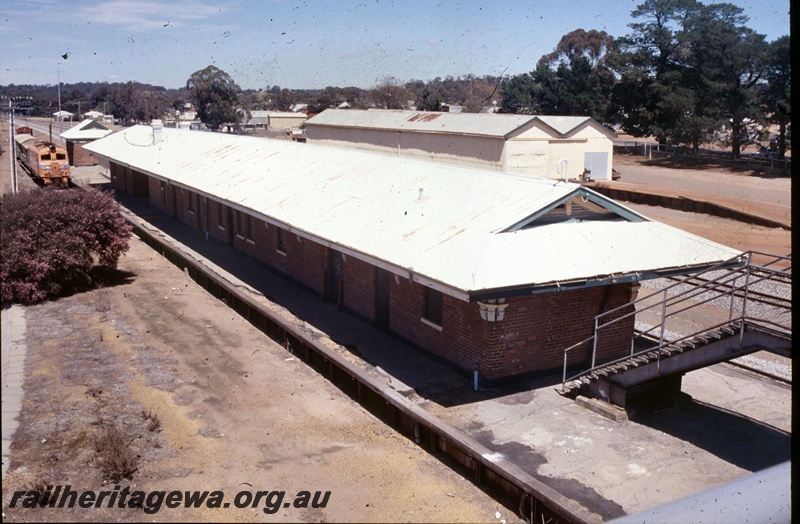 P19567
Station building, Narrogin, GSR line, elevated view from the footbridge, east side and end view, shows the degree of rationalisation of the yard by 2002
