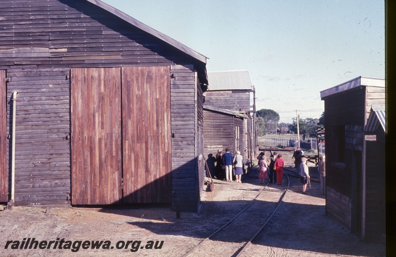 P19572
3 of 6 images of Millars workshops at Yarloop, vie looking south, north end of the main workshop on the left, sand shed on the right
