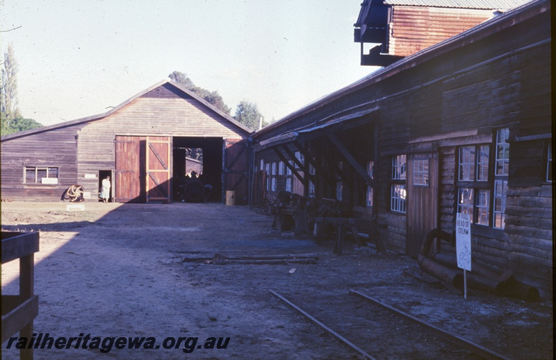 P19573
4 of 6 images of Millars workshops at Yarloop, view looking south, main workshops on the right, carriage building section in the centre
