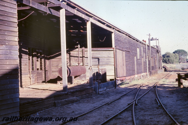 P19574
5 of 6 images of Millars workshops at Yarloop, view looking south, main workshop boiler house on the left, furnace moulding section in the background
