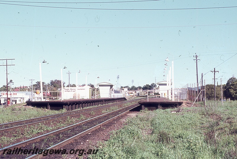 P19858
Platforms, station shelters, platform lamps, tracks, Loch Street, ER line, view from track level

