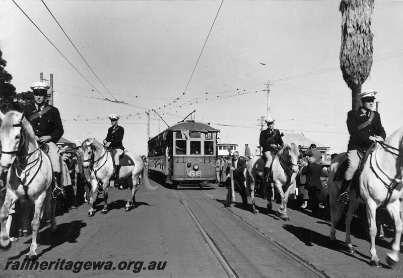 P19872
Tram 66 - operating last Perth tram service . Photo taken at Barrack Street, jetty. Tram escorted by police on horses.
